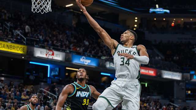 Milwaukee Bucks forward Giannis Antetokounmpo (34) shoots the ball while Indiana Pacers center Myles Turner (33) 